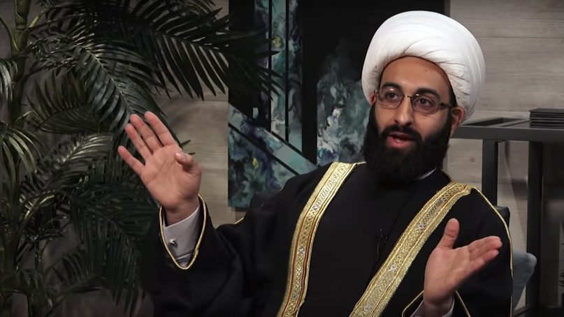 Imam Mohammad Tawhidi participates in an interview. Many of Tawhidi's detractors question his credentials and call him the “fake sheikh.” Video screenshot