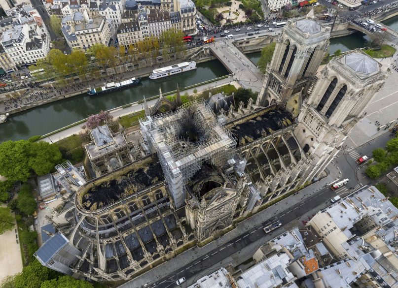 An aerial shot of the fire damage to Notre Dame Cathedral in central Paris on April 16. Pledges totaling more than $1 billion have already poured in from ordinary worshippers and high-powered magnates around the world to restore Notre Dame Cathedral in Paris after it was damaged in a massive fire on Monday. (Gigarama.ru via AP)