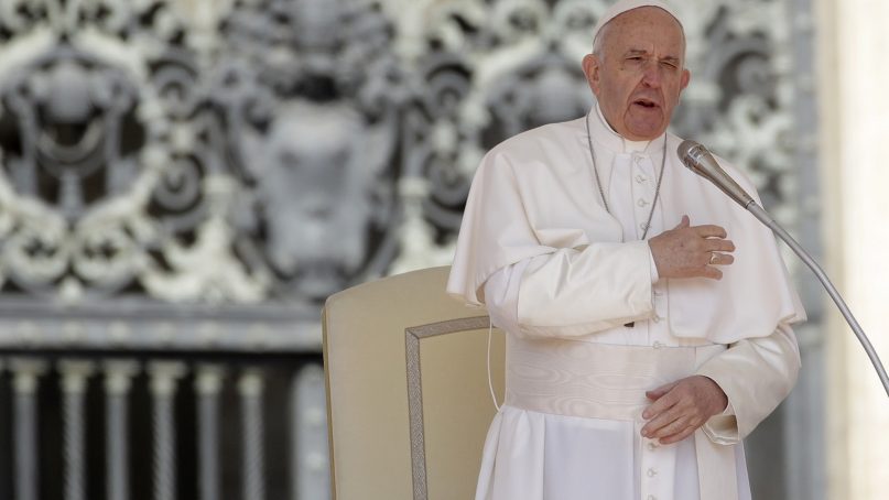 Pope Francis makes the sign of the cross during his weekly general audience in St. Peter's Square at the Vatican on May 8, 2019. (AP Photo/Alessandra Tarantino)
