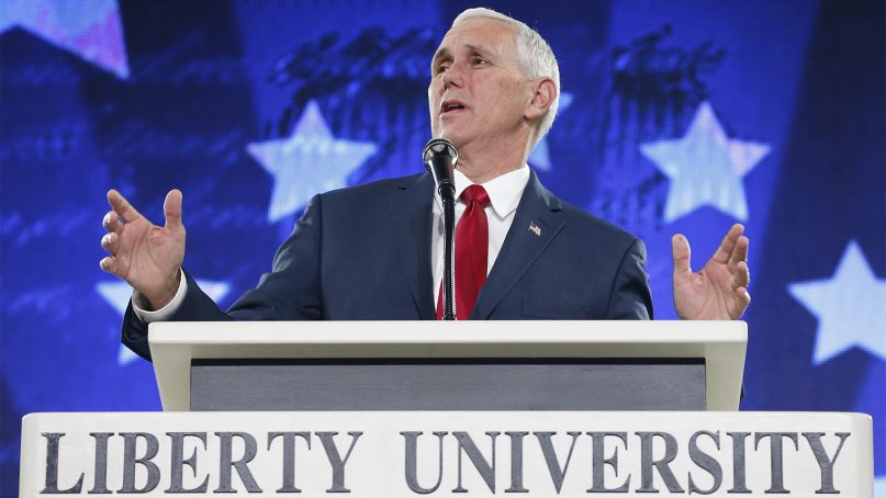 In this file photo, then-Republican vice-presidential nominee, Indiana Gov. Mike Pence, speaks at Liberty University in Lynchburg, Va., on Oct. 12, 2016. Pence spoke at the commencement on May 11, 2019. (AP Photo/Steve Helber)