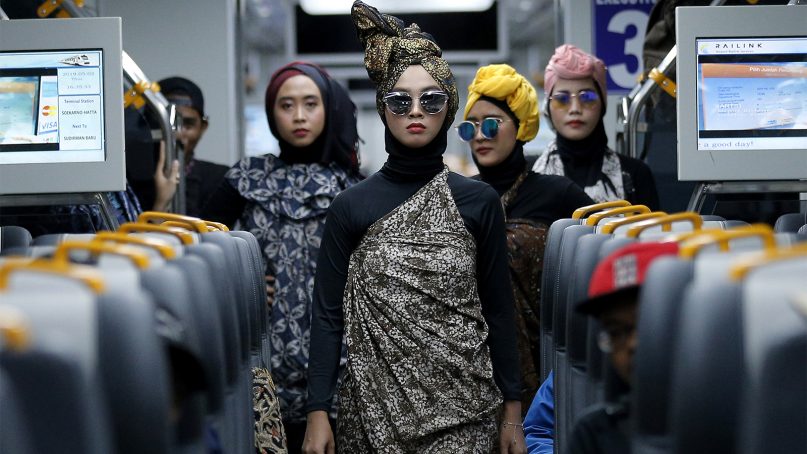 Models perform a Muslim fashion show on an airport train in Jakarta, Indonesia, on May 2, 2019. The fashion show was held to greet the upcoming fasting month of Ramadan, the holiest month on the Muslim calendar. (AP Photo/Tatan Syuflana)