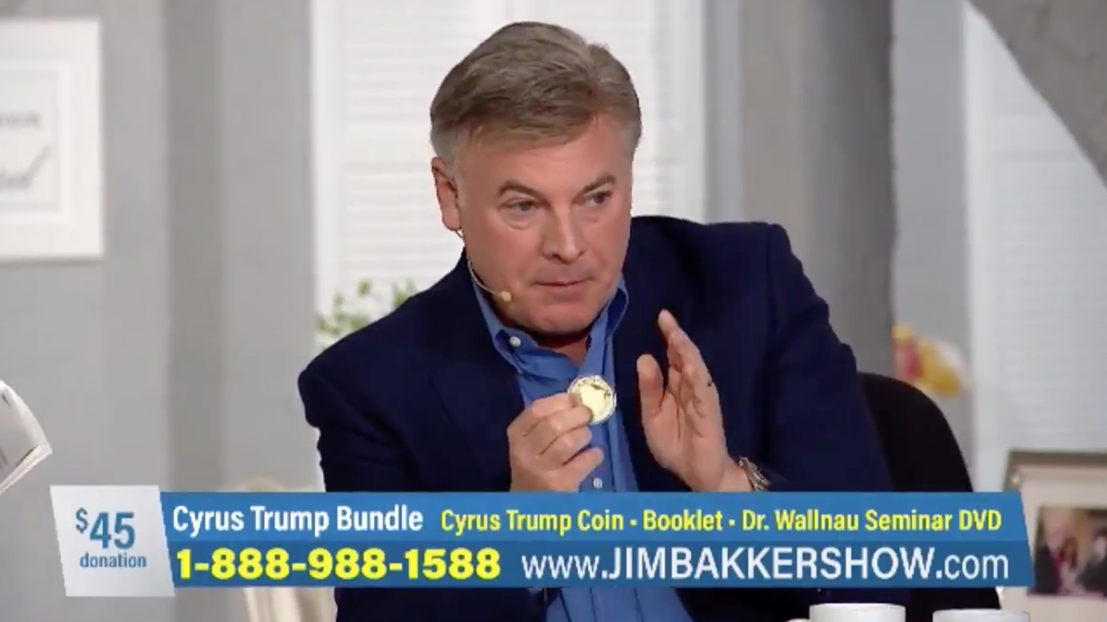 Televangelist Lance Wallnau explains the significance of a gold coin featuring King Cyrus and President Trump on the Jim Bakker Show. Video screenshot