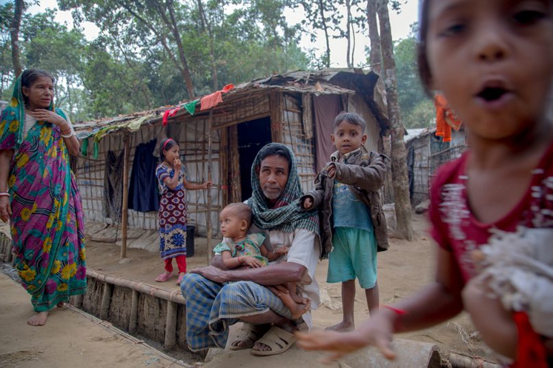 Hindu Rohingyas take part in daily life in their secluded refugee settlement in Dec. 2018, near Kutupalong, Bandladesh. RNS photo by Amir Hamza