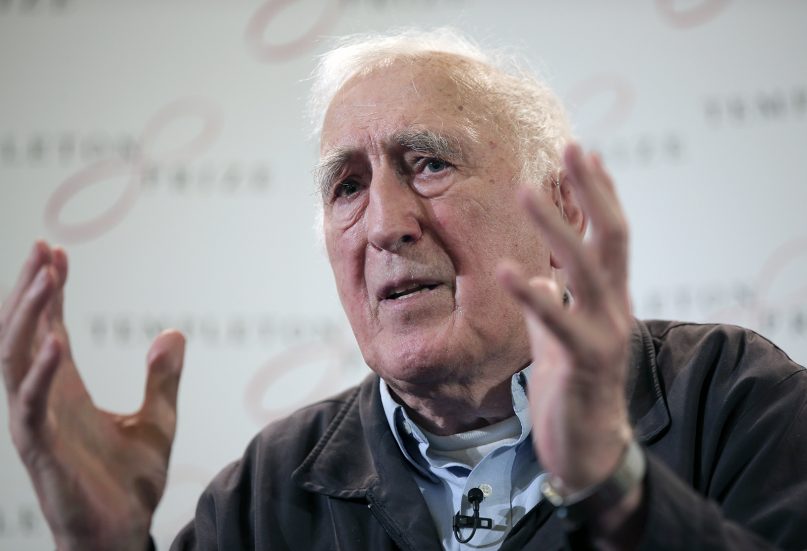 Jean Vanier, the founder of L'Arche, an international network of communities where people with and without intellectual disabilities live and work together, gestures as he talks during a news conference in London on March 11, 2015. (AP Photo/Lefteris Pitarakis)
