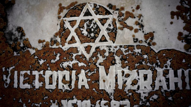 The Star of David decorates a tomb eroded by moss at the Jewish cemetery in Guanabacoa in eastern Havana on June 7, 2019. Slowly, the first Jewish cemetery in Cuba is beginning to be rehabilitated, along with the memory of many of the island's early Jewish forebears. (AP Photo/Ramon Espinosa)