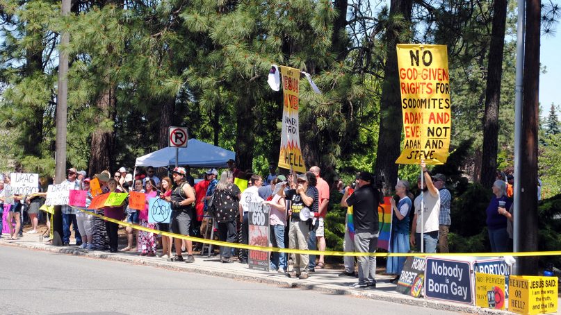 People protest Drag Queen Story Hour outside the South Hill Library in Spokane, Wash., on June 15, 2019. RNS photo by Tracy Simmons