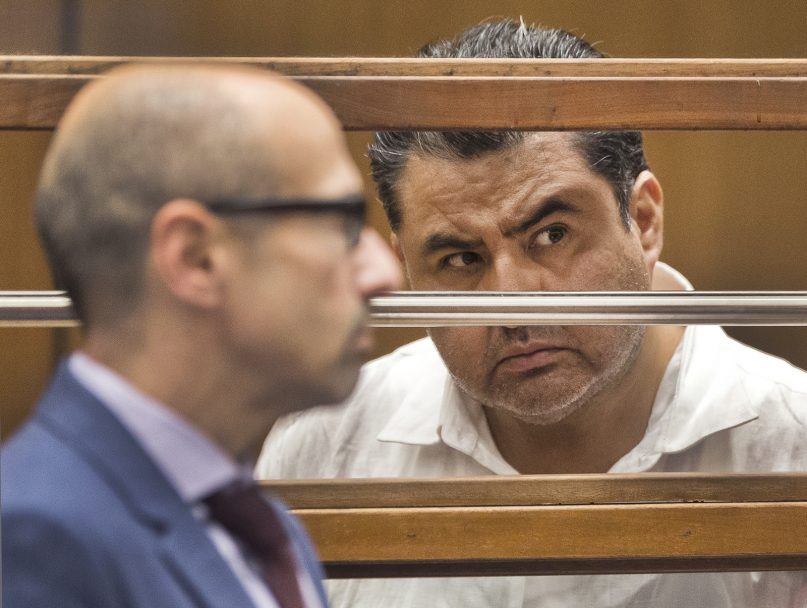 Naasón Joaquín García, right, the leader of fundamentalist Mexico-based church La Luz del Mundo, appears in Los Angeles County Superior Court on June 5, 2019, before Judge Francis Bennett on charges of human trafficking and child rape. (AP Photo/Damian Dovarganes)