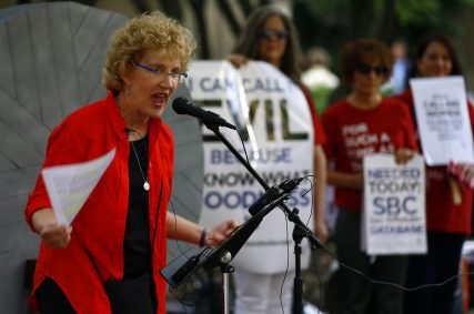 Christa Brown talks about her abuse at a rally outside the annual meeting of the Southern Baptist Convention at the Birmingham-Jefferson Convention Complex on June 11, 2019, in Birmingham, Ala. RNS photo by Butch Dill