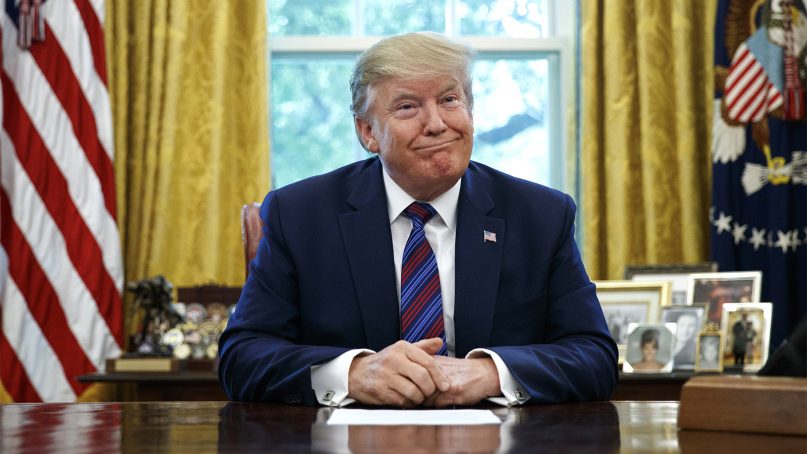 President Trump pauses as he speaks in the Oval Office of the White House in Washington on July 26, 2019. (AP Photo/Carolyn Kaster)
