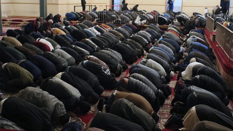 Muslims packed the prayer hall in one the city's oldest mosques, the Muslim Community Center, for Friday prayers in Chicago, on Friday, March 15, 2019. (AP Photo/Noreen Nasir)
