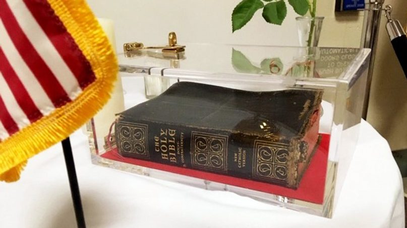 A Catholic Bible within a plexiglass case on a prominent POW/MIA table display in the entrance of the VA medical facility in Manchester, N.H., is one example of what would be allowable under the VA's new policies. Photo courtesy of Military Religious Freedom Foundation