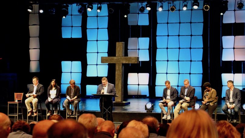 The elders at Willow Creek Community Church lead a service of worship and reflection on July 23, 2019, in the Lakeside Auditorium on the church's main campus in South Barrington, Ill. RNS photo by Emily McFarlan Miller
