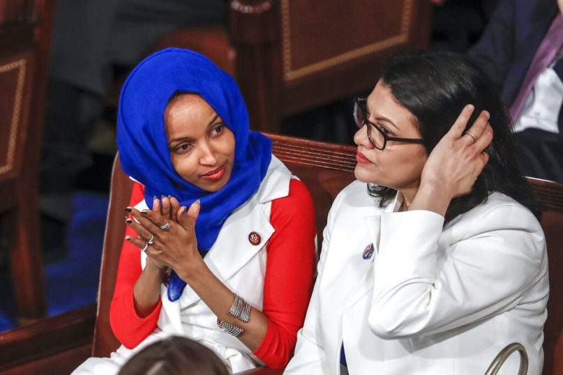 In this Feb. 5, 2019, file photo, Rep. Ilhan Omar, D-Minn., left, and Rep. Rashida Tlaib, D-Mich., listen to President Trump's State of the Union speech, at the Capitol in Washington. Israel's prime minister is holding consultations with senior ministers and aides to reevaluate the decision to allow two Democratic congresswomen to enter the country next week. A government official said Aug. 15, 2019, that Benjamin Netanyahu was holding consultations about the upcoming visit of Omar and Tlaib and that 