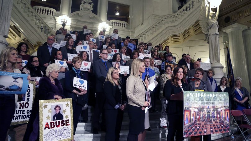 People rally in the rotunda at the Capitol in Harrisburg, Pa., on Oct. 24, 2018. Survivors of child sexual abuse by Catholic clergy and others ramped up pressure on Pennsylvania's Republican senators to vote on a bill that would give victims a two-year window to file lawsuits that would otherwise be outdated. More than 100 people rallied at the state Capitol after the Senate GOP majority's decision to leave Harrisburg without voting on the legislation. (AP Photo/Jacqueline Larma)