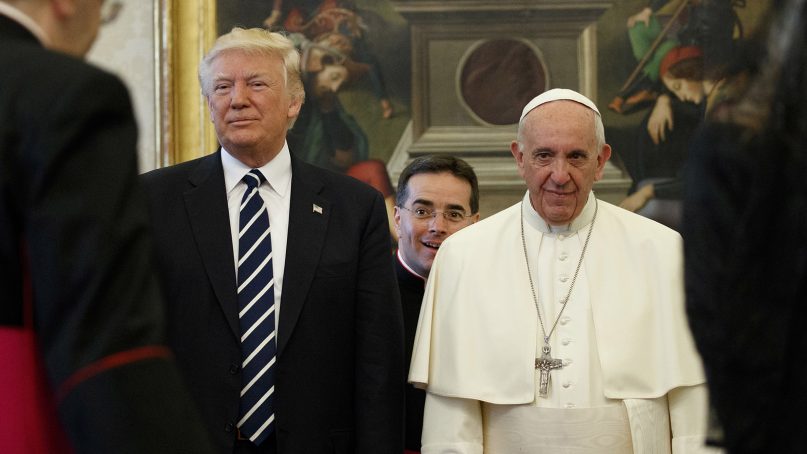 U.S. President Donald Trump stands next to Pope Francis during a private audience at the Vatican on May 24, 2017. (AP Photo/Evan Vucci)
