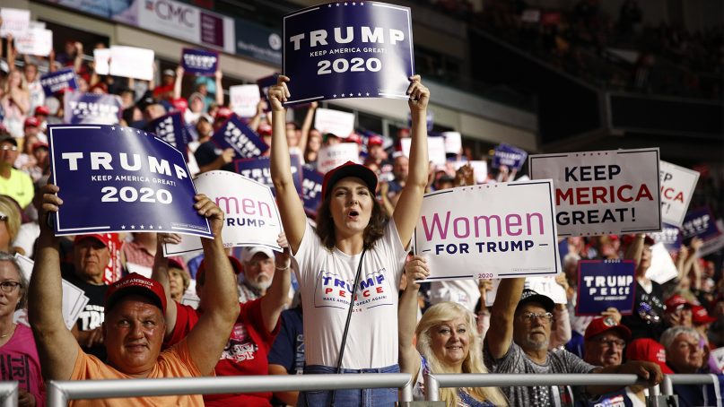 Supporters rally as President Donald Trump speaks at a campaign rally Aug. 15, 2019, in Manchester, N.H. (AP Photo/Patrick Semansky)