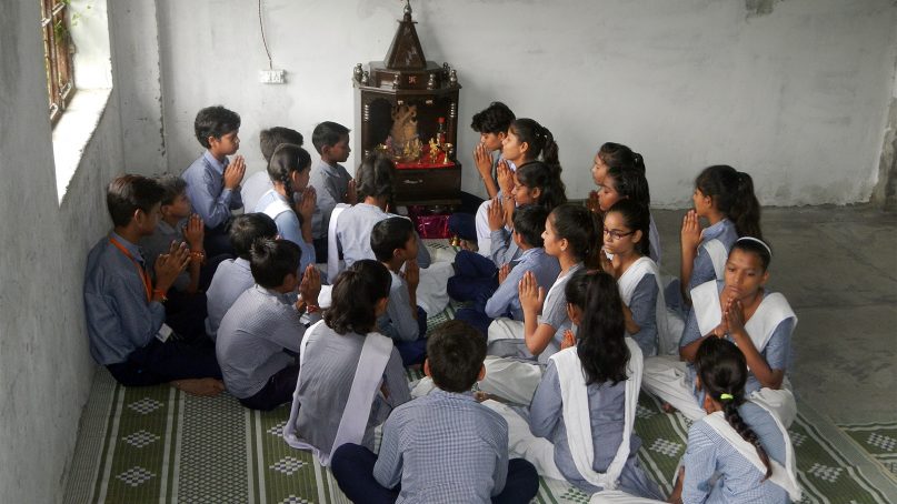 Hindu students recite Vedic mantras in the new prayer room at Chacha Nehru School in Aligarh, India. RNS photo by Priyadarshini Sen