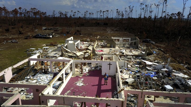 Pastor Jeremiah Saunders stands among the ruins of his church that was destroyed by Hurricane Dorian, in High Rock, Grand Bahama, Bahamas, on Sept. 11, 2019. Jeremiah says 