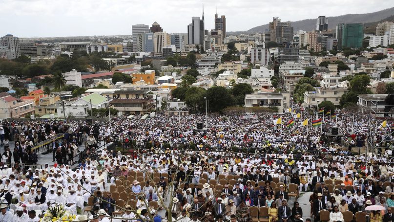Faithful attend a Mass celebrated by Pope Francis at the Monument Mary Queen of Peace, in Port Louis, Mauritius, on Sept. 9, 2019. Francis arrived in the Indian Ocean nation of Mauritius to celebrate its diversity, encourage its ethical development, and honor a 19th century French missionary who ministered to freed slaves. (AP Photo/Alessandra Tarantino)