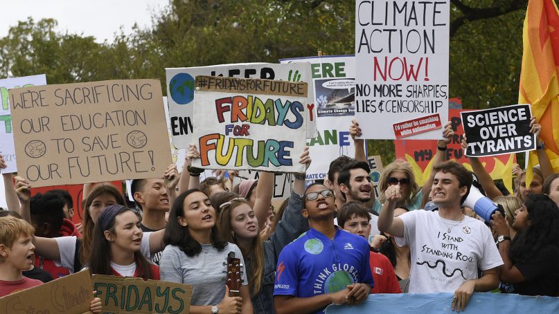 Young climate activists march during a rally outside the White House in Washington on Sept. 13, 2019. (AP Photo/Susan Walsh)