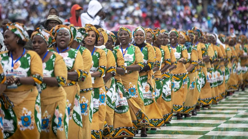 Women sing and dance during a Mass celebrated by Pope Francis at the Zimpeto Stadium, on the outskirts of the capital Maputo, Mozambique, on Sept. 6, 2019. Pope Francis wrapped up his visit to Mozambique on Friday by consoling HIV-infected mothers and children and denouncing the rampant corruption that has helped make the southern African nation one of the world's poorest countries. (AP Photo/Ben Curtis)