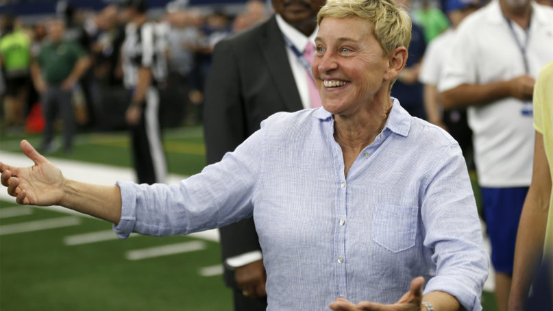 Entertainer Ellen DeGeneres walks on the field during warmups before an NFL football game between the Green Bay Packers and the Dallas Cowboys in Arlington, Texas, Sunday, Oct. 6, 2019. (AP Photo/Ron Jenkins)