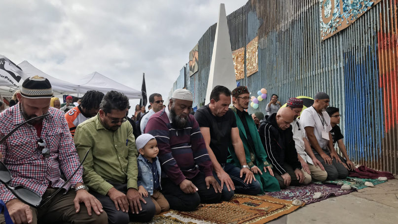 Muslims gather in midday prayer for “Pray Beyond Borders” on Sunday, Oct. 27, 2019, along the U.S.-Mexico border in Tijuana. RNS photo by Alejandra Molina
