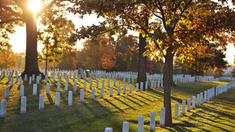 The sun rises over Arlington National Cemetery, Nov. 5, 2011. U.S. Coast Guard photo by Petty Officer 2nd Class Patrick Kelley/Creative Commons