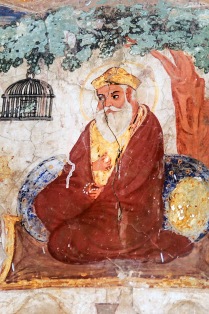 An early 19th century mural depicting Guru Nanak at the Gurdwara Baba Atal in Amritsar, India. Image courtesy of Creative Commons