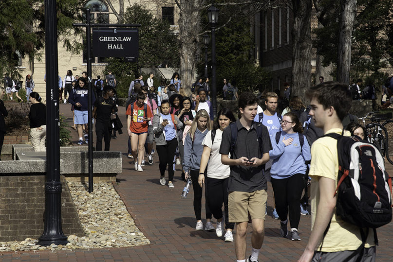Students walk through the UNC-Chapel Hill campus in Feb. 2019. Photo by Dennis Ludlow/Creative Commons