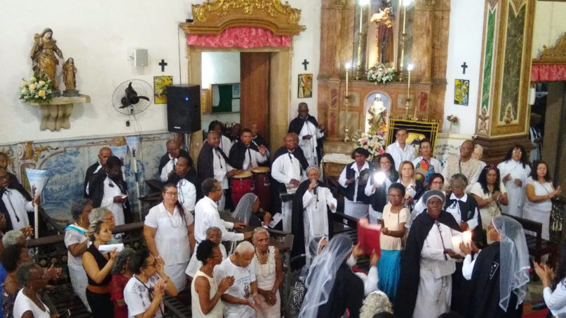 Members of black brotherhoods participate in a service at the Church of Our Lady of the Rosary of the Black Men in Salvador, Brazil. Courtesy photo by William Justo