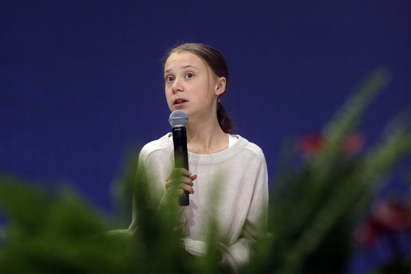 Climate activist Greta Thunberg speaks during a meeting with leading climate scientists at the COP25 summit in Madrid on Dec. 10, 2019. Thunberg was in Madrid where the global U.N.-sponsored climate change conference was taking place. (AP Photo/Paul White)