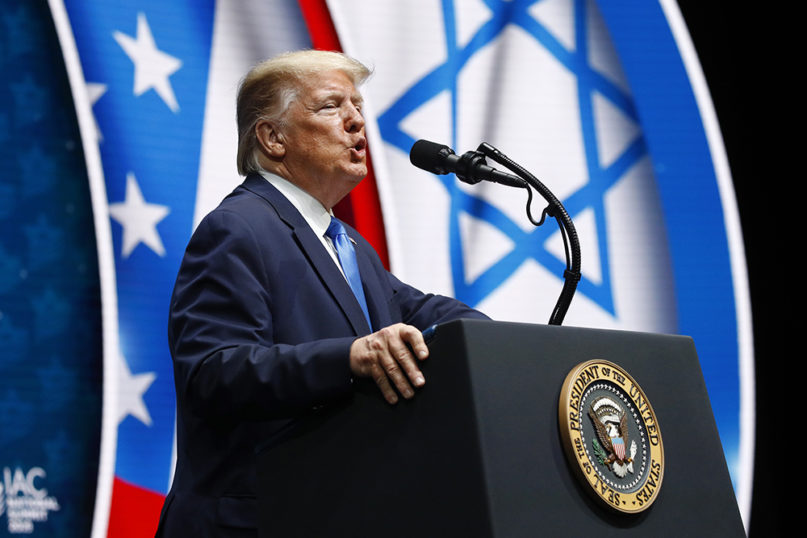 President Donald Trump speaks at the Israeli American Council National Summit in Hollywood, Florida, on Dec. 7, 2019. (AP Photo/Patrick Semansky)