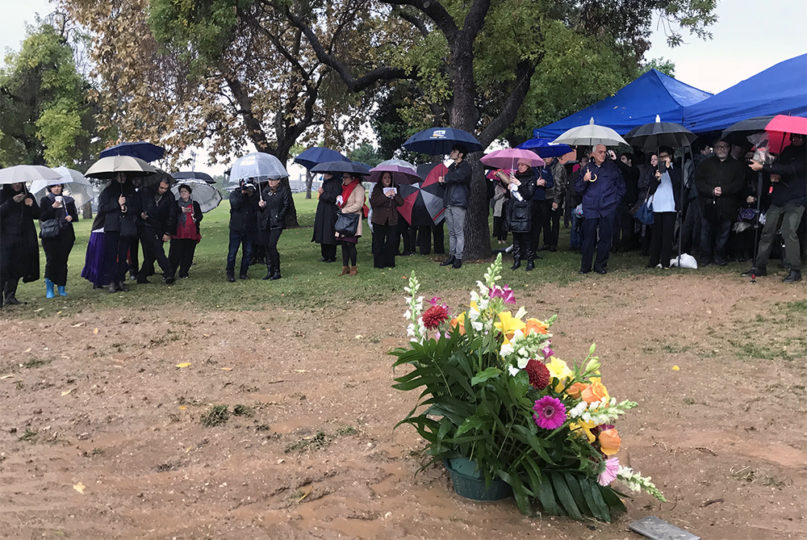 Dozens of people gather for an interfaith service honoring the unclaimed dead who were buried at the Los Angeles County Crematorium Cemetery on  Dec. 4, 2019. RNS photo by Alejandra Molina