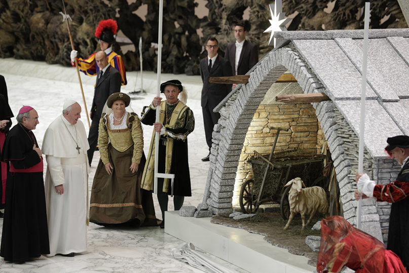 Pope Francis attends an audience with delegations of the donors of the Christmas tree and Nativity Scene at the Vatican, Thursday, Dec. 5, 2019. (AP Photo/Andrew Medichini)