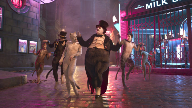 James Corden, center, as Bustopher Jones in the new film “Cats.” Photo courtesy of Universal Pictures