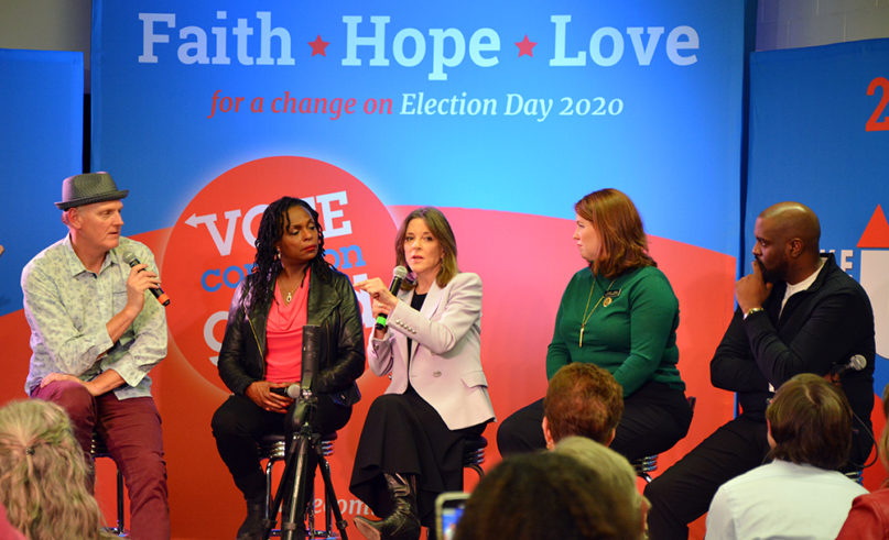 Democratic presidential candidate Marianne Williamson, center, participates in a panel discussion Thursday, Jan. 9, 2020, in Des Moines, Iowa. RNS photo by Jack Jenkins