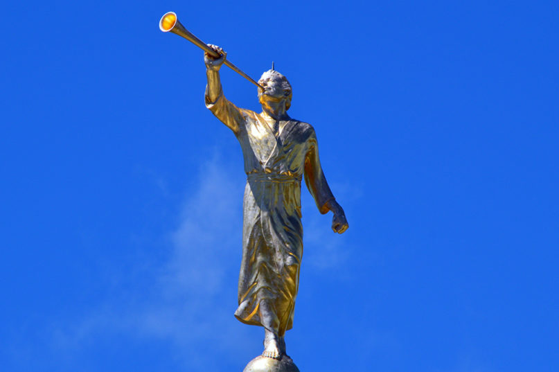 An Angel Moroni statue sits atop a temple of The Church of Jesus Christ of Latter-day Saints. Photo by Erika Wittlieb/Pixabay/Creative Commons