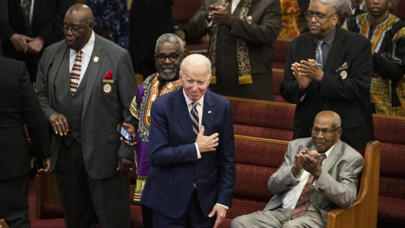 Democratic presidential candidate former Vice President Joe Biden acknowledges applause from parishioners as he departs after attending services, Sunday, Feb. 23, 2020, at the Royal Missionary Baptist Church in North Charleston, S.C. (AP Photo/Matt Rourke)