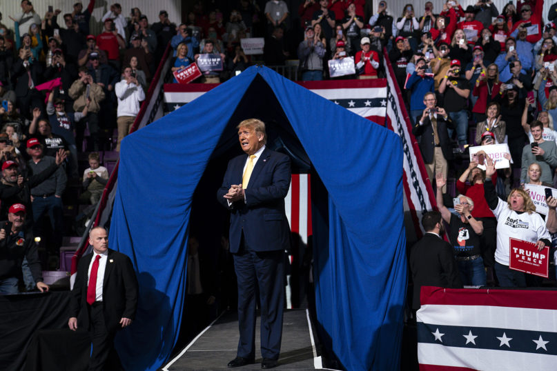 President Donald Trump arrives to speak at a campaign rally at The Broadmoor World Arena, Thursday, Feb. 20, 2020, in Colorado Springs, Colo. (AP Photo/Evan Vucci)