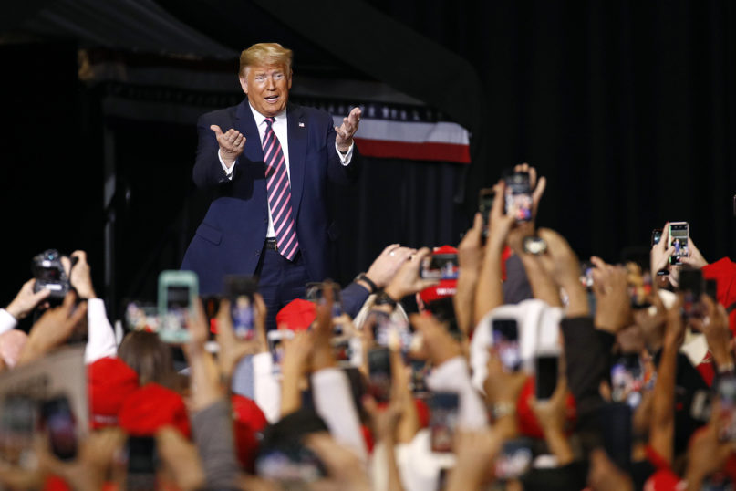 President Donald Trump walks onstage to speak at a campaign rally on Feb. 21, 2020, in Las Vegas. (AP Photo/Patrick Semansky)