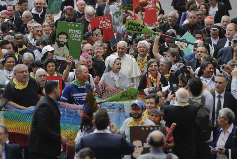 Pope Francis walks in a procession on the occasion of the Amazon synod, at the Vatican, on Oct. 7, 2019. Francis opened a three-week meeting on preserving the rainforest and ministering to its native people as he fended off attacks from conservatives who are opposed to his ecological agenda. (AP Photo/Andrew Medichini)