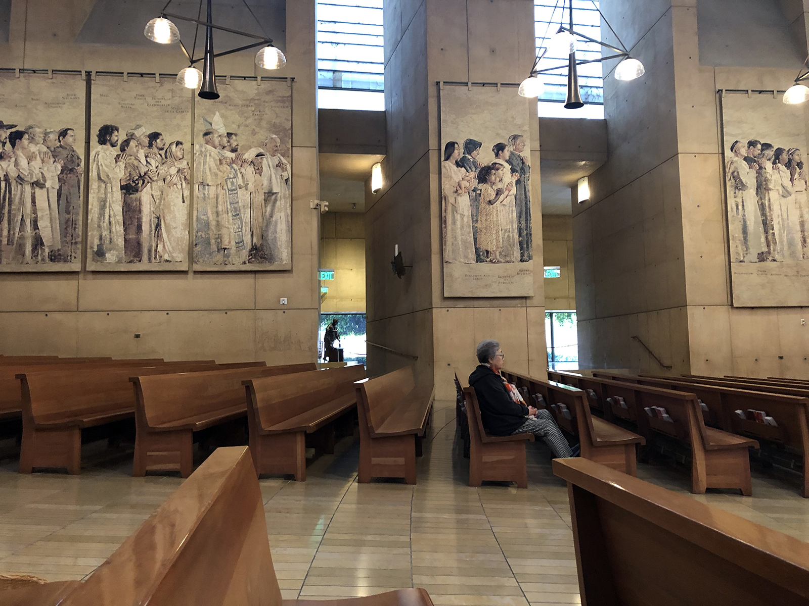 ‘Prayer in the Time of Coronavirus’: LA parishioners worship in mostly empty pews