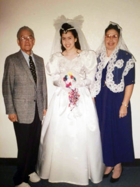 Raquel Guerra, now 41, poses with her parents in 1992 on the day of her 14th-year presentation. Once she turned 14, she declared she wanted to continue in La Luz del Mundo Church. Photo courtesy of Raquel Guerra