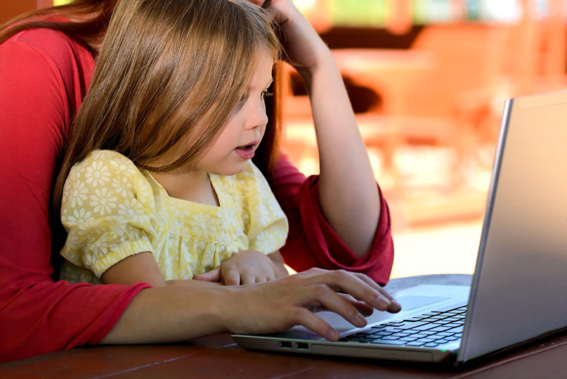 Many women are suddenly trying to balance working from home while raising and educating their children while schools are closed. Photo by Chuck Underwood/Pixabay/Creative Commons