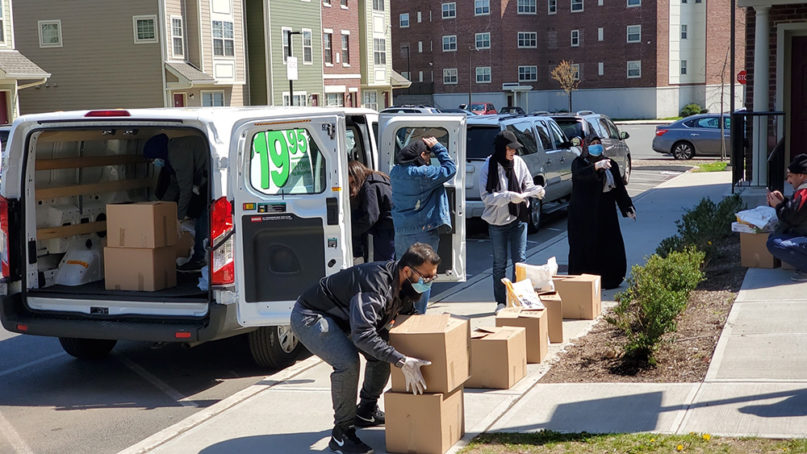 Muslims Giving Back distributes Ramadan food boxes to refugee families in New Jersey. Photo courtesy of MCC