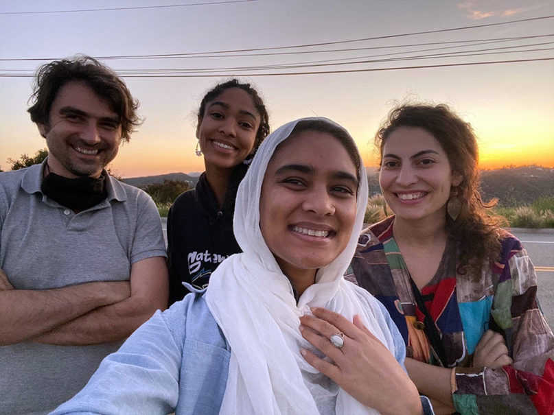 The four fellows of Abrahamic House, Jonathan Simcosky, from left, Maya Mansour, Ala’ Khan and Hadar Cohen, pose for a selfie while watching a sunset in the Los Angeles hills in celebration of the start of Ramadan, April 23, 2020. Photo by Ala’ Khan