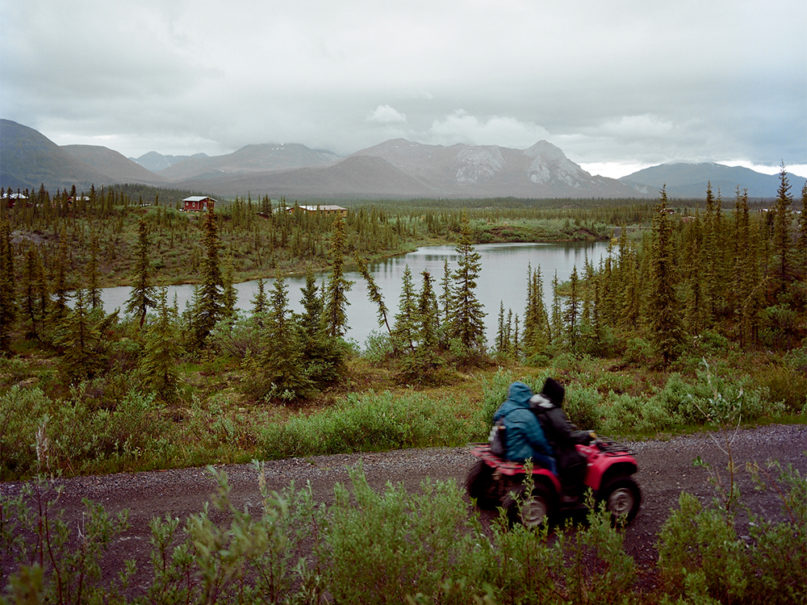 A four-wheeler is ridden through Arctic Village, Alaska, on June 14, 2019. Photo by Brian Adams