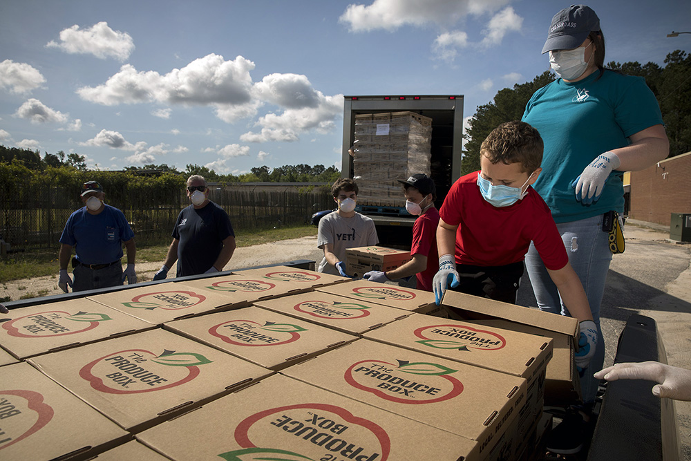 Trained in rebuilding after disasters, NC Baptists now distribute food boxes