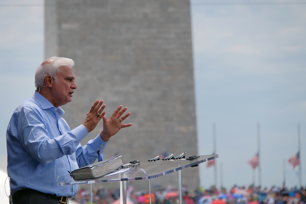 Ravi Zacharias addresses a crowd gathered on the National Mall for Together 2016 in Washington. Photo courtesy of RZIM